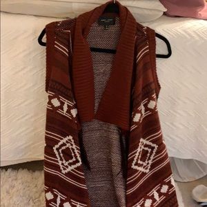 Red patterned sleeveless sweater